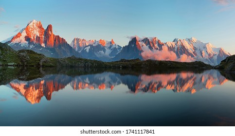 Magical sunset panorama of the Lac Blanc lake and Mont Blanc (Monte Bianco) on background, Chamonix location. Beautiful outdoor scene in Vallon de Berard Nature Reserve, France