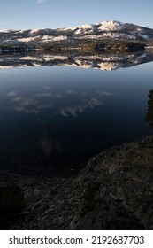 Magical View Of The Andes Mountains, Forest And Blue Sky Reflection In The Lake At Sunrise.