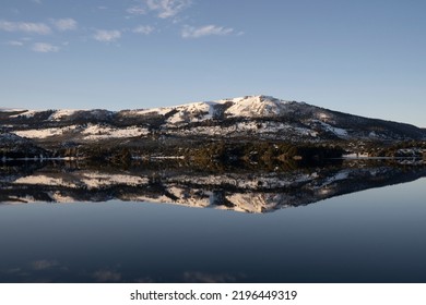 Magical View Of The Andes Mountains, Forest And Blue Sky Reflection In The Lake At Sunrise.	