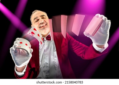 Magician With Cards, Card Manipulation, Croupier Or Casino Dealer At Gambling Club Or Casino. Close Up Of Male Hand With Poker Cards.