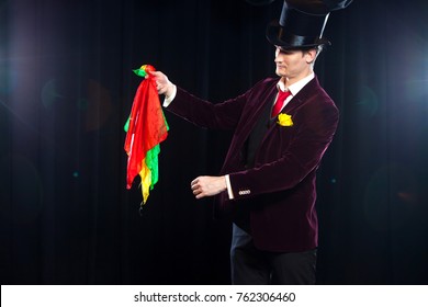 Magician, Juggler Man, Funny Person, Black Magic, Illusion Focus With Colored Cloth With Cloths