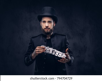 Magician showing trick with playing cards. - Shutterstock ID 794704729