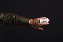 Magician Shows Trick With Playing Cards. Sleight Of Hand. Manipulation With Props.