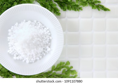 Magnesium Bath Crystals On White Tile