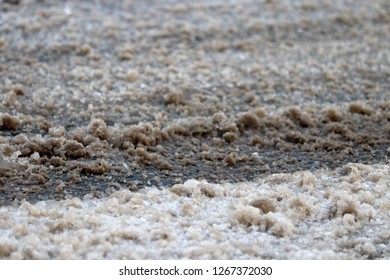 Magnesium and Sodium Chlorides, sand on the winter road