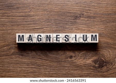 Magnesium - word concept on building blocks, text