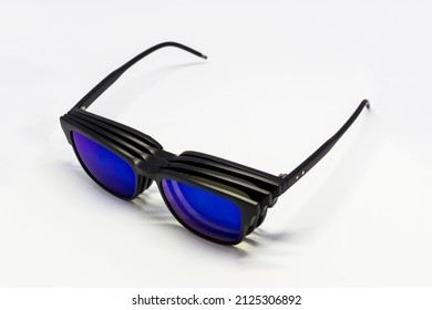 Magnetic clip-on sunglasses with interchangeable lenses
