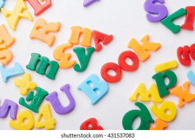 Colorful Magnetic Letters Isolated On White Stock Photo (Edit Now ...