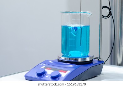 A magnetic stirrer or magnetic mixer is a laboratory device that employs a rotating magnetic field to cause a stir bar immersed in a liquid to spin very quickly, thus stirring it. 