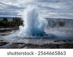 The magnificent blast of the Strokkur Geyser in Iceland