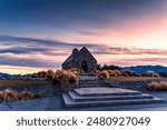 Magnificent holy the Church of the good shepherd with colorful sunrise sky on shore of Lake Tekapo at Canterbury, South Island of New Zealand