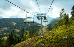Magnificent Landscapes Of Sochi On The Open Cable Car To The Top Of The Mountain Rose Peak With Views Of The Forest And The Mountains And The Sky.
