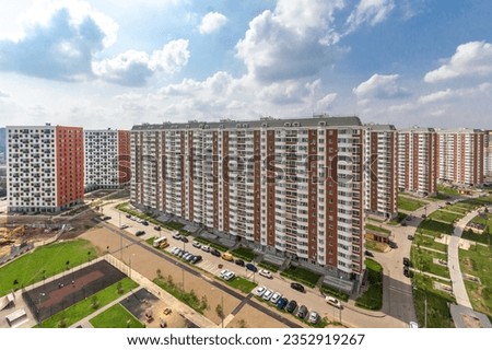 Magnificent panoramic view of the new Butovo district with modern multi-storey buildings on a clear summer day.