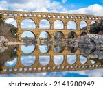 The magnificent Pont du Gard, an ancient Roman aqueduct bridge, Vers-Pont-du-Gard in southern France. Built in the first century AD to carry water to the Roman colony of Nemausus (Nîmes)