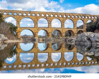 The magnificent Pont du Gard, an ancient Roman aqueduct bridge, Vers-Pont-du-Gard in southern France. Built in the first century AD to carry water to the Roman colony of Nemausus (Nîmes) - Shutterstock ID 2141980949