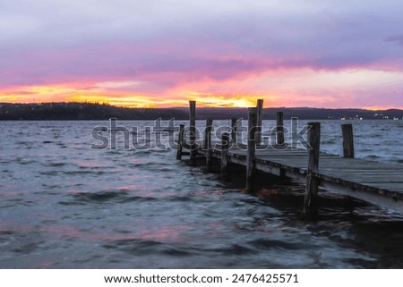 Similar – Image, Stock Photo Tranquil sunset over smooth water