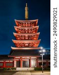 The magnificent temple complex is illuminated against the night sky. Senso-ji is the oldest Buddhist temple in Tokyo. Travel to Japan