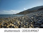 Magnificent view of Punta Molentis beach In Sardinia, taken during the summer: A completely uncontaminated and natural Mediterranean pebble beach.