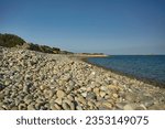 Magnificent view of Punta Molentis beach In Sardinia, taken during the summer: A completely uncontaminated and natural Mediterranean pebble beach.