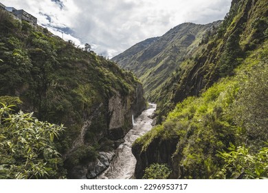 Magnificent view of the river and mountains in a deep canyon in the city of Banos, Ecuador. - Powered by Shutterstock