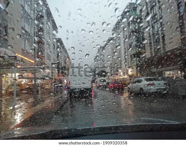 magnificent view of the street and outside from\
the window after it\
rains\
