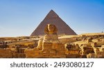 Magnificent wide landscape view of the Great Sphinx of Giza with the Pyramid of Khafre in the background as seen from the valley temple on the Giza plateau near Cairo,Egypt