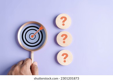 Magnifier focus to target solution target which among question icon, successful business and thinking solution strategy concept.