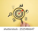 Magnifier glass focus on target dartboard, Business development strategy, and action plan concept with icon business strategy and Action plan, search, goal, strategy, success