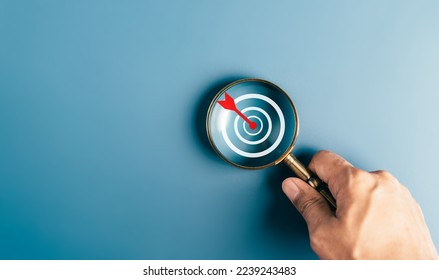 Magnifier glass focus to target icon which for planning development leadership and customer target group concept.	 - Shutterstock ID 2239243483