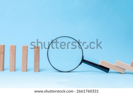 Magnifier Interrupts Falling Dominoes, Visual Metaphor For Observation, Audit, Or Discovery In Business