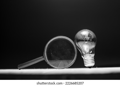 magnifying glass and bulb,business idea - Shutterstock ID 2226685207