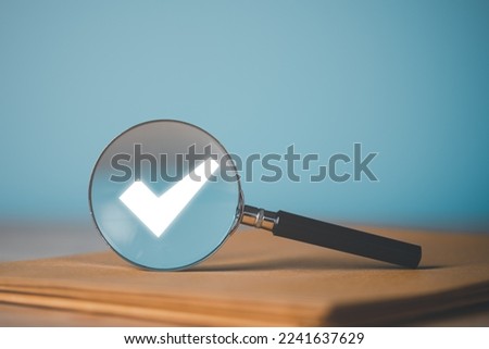 magnifying glass and check mark icon,show check the authenticity of the document,concept of rules of conduct rules and policies company regulations Terms and Conditions Stock foto © 