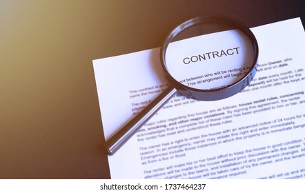 Magnifying Glass and document close up - Shutterstock ID 1737464237