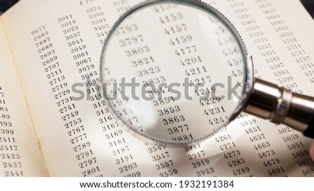 magnifying glass and document with figures, data encrypt with magnifying glass. Cipher encryption code or data