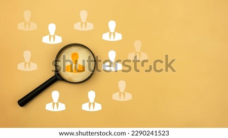 Magnifying glass focus among staff icons for human development recruitment leadership and customer target group, sample search, personnel finding a good job candidate. leadership person, HR concept