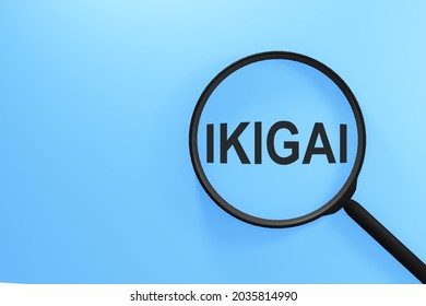 Magnifying glass with the inscription IKIGAI on a blue background.