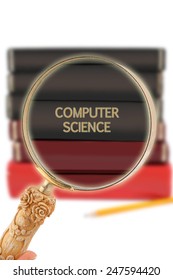 Magnifying Glass Or Loop Looking On An Educational Subject - Computer Science