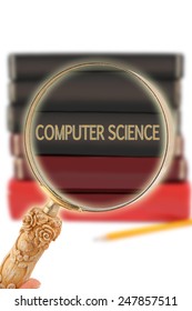 Magnifying Glass Or Loop Looking On An Educational Subject - Computer Science