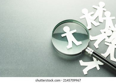 Magnifying Glass With Many Paper Human Dolls, Recruitment, Human Resources Analytics, Leader And Talent Employee, Man Selection