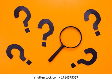 Magnifying Glass With Many Qustion Mark Symbol On Yellow Background