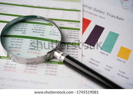 Magnifying glass on charts graphs paper. Financial development, Banking Account, Statistics, Investment Analytic research data economy, Stock exchange trading, Business office company meeting concept. Stock photo © 
