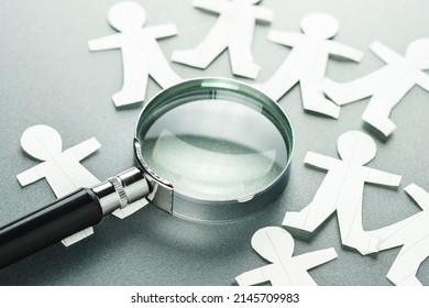 Magnifying Glass On Many Paper Human Dolls, Man Management, Human Resources Analytics, Searching The Right Man For A Business, Recruitment Concept