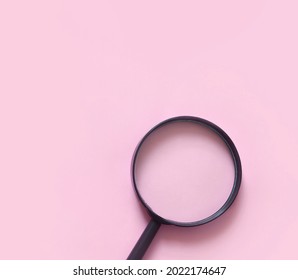 Magnifying Glass On Pink Background, Flat Lay Minimal Style