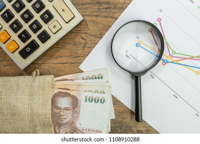 Magnifying Glass On Thai Banknote Stack Forging Ideas Analysis Of The Economy Future Investment Fund Saving