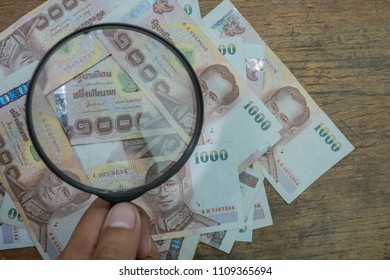 Magnifying Glass On Thai Banknote Stack Forging Ideas Analysis Of The Economy Future Investment Fund Saving