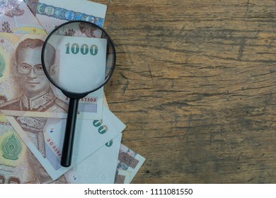 Magnifying Glass On Thai Banknote Stack Forging Ideas Analysis Of The Economy Future Investment Fund Saving