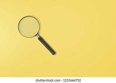 Magnifying Glass On Yellow Background. Top View. Flat Lay. Copy Space. Concept