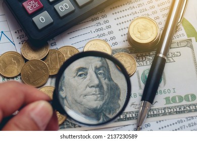  A Magnifying Glass Over A US Dollar And Some Coins In The Image Composition.The Idea For The Economy And The Moment Of Crisis With High Inflation. World Economics And Inflation Control, Inflation


