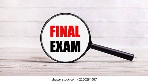 The Magnifying Glass Stands Vertically On A Light Background With The Text FINAL EXAM