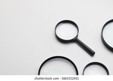 Magnifying glass with varies size for many people. - Shutterstock ID 1863152431